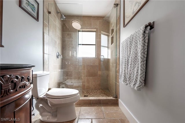106 Pago Pago Dr W, Naples, FL 34113 - bathroom featuring a shower stall, toilet, baseboards, and stone tile floors