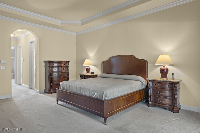 bedroom featuring light carpet and ornamental molding