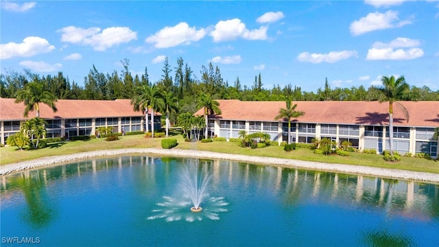 view of pool with a water view