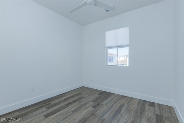 empty room with hardwood / wood-style flooring and ceiling fan