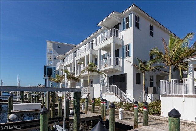 view of building exterior featuring a water view