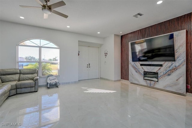 living room with ceiling fan