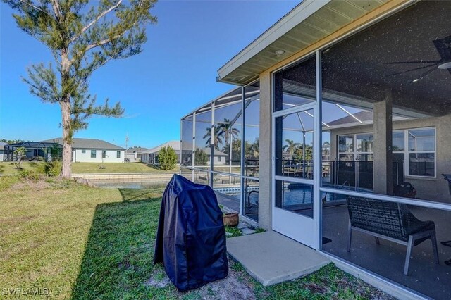 view of yard featuring a lanai