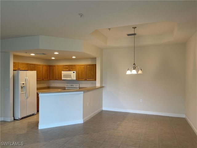 kitchen featuring kitchen peninsula, a chandelier, decorative light fixtures, white appliances, and light tile patterned floors