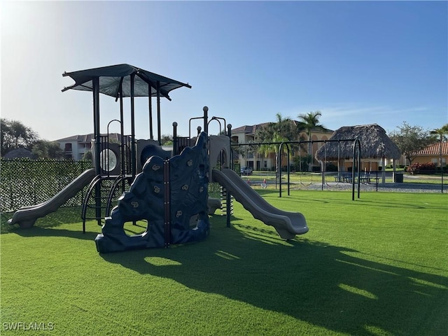 view of jungle gym with a yard