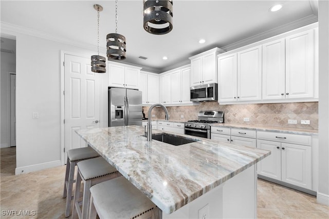 kitchen with white cabinetry, sink, and appliances with stainless steel finishes