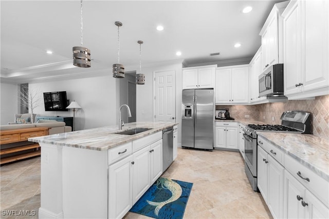 kitchen with sink, white cabinets, a center island with sink, and appliances with stainless steel finishes