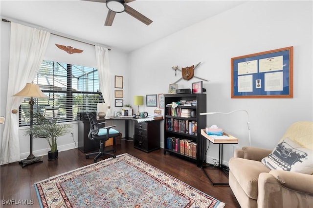 home office featuring ceiling fan and dark hardwood / wood-style floors