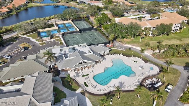 birds eye view of property featuring a water view