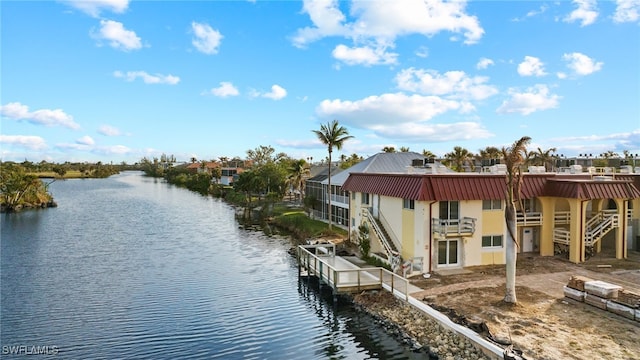 exterior space with a water view