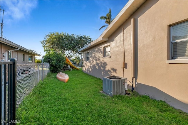 view of yard featuring central AC