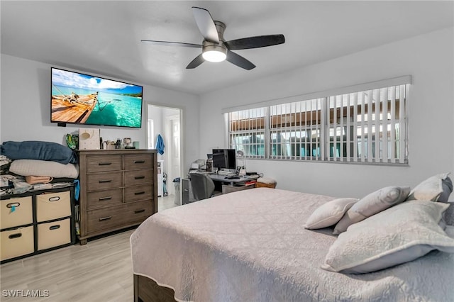 bedroom featuring ceiling fan and light wood-type flooring