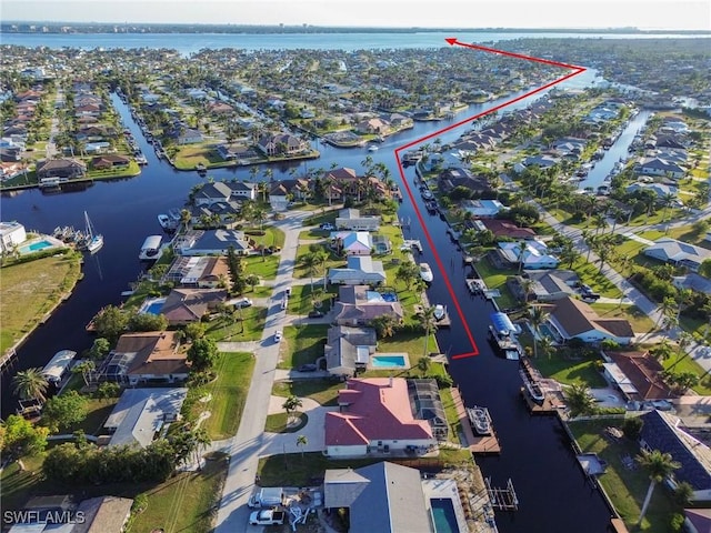 drone / aerial view featuring a water view