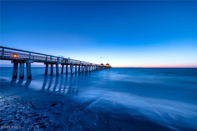 view of dock with a water view