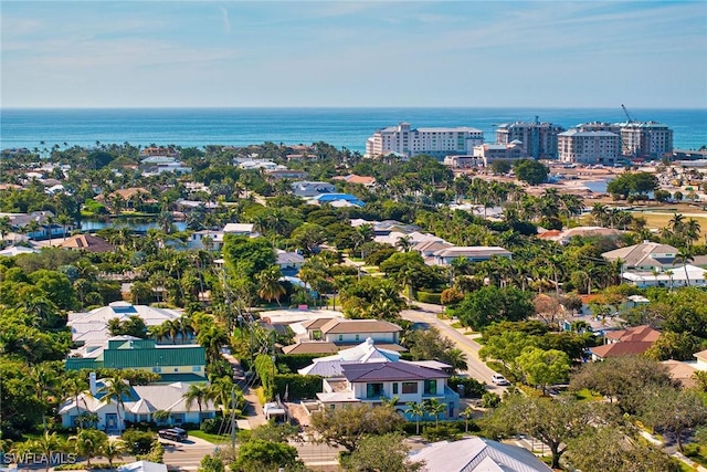 bird's eye view with a residential view and a water view
