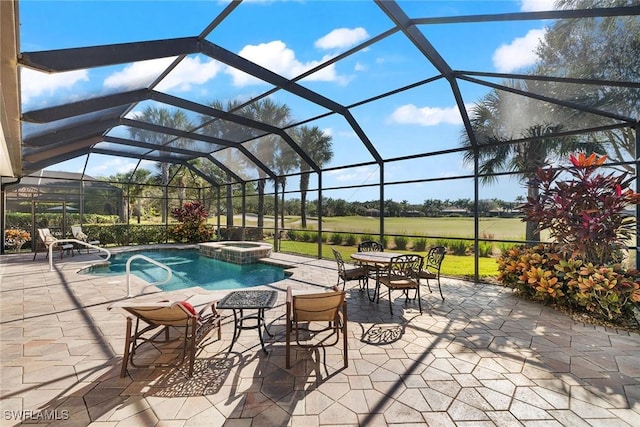 view of swimming pool with glass enclosure, a patio area, and an in ground hot tub