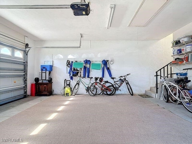 garage featuring a garage door opener