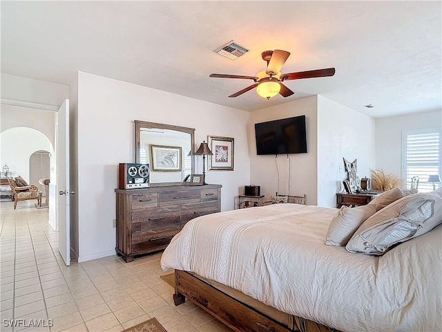 bedroom featuring ceiling fan and light tile patterned flooring