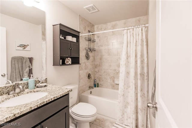 full bathroom with vanity, toilet, and shower / tub combo with curtain