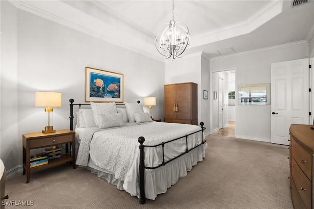 carpeted bedroom with a raised ceiling, ornamental molding, and a chandelier