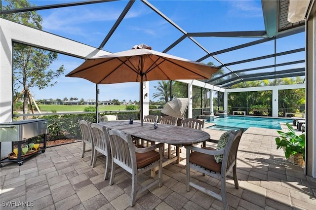 view of patio featuring glass enclosure