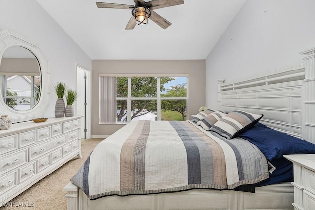 carpeted bedroom featuring ceiling fan and lofted ceiling