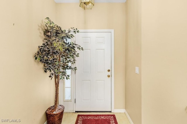 foyer with light tile patterned floors