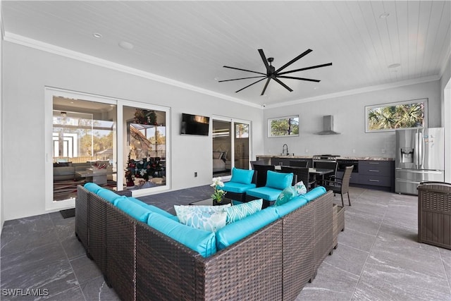 living room with ceiling fan, ornamental molding, and wood ceiling