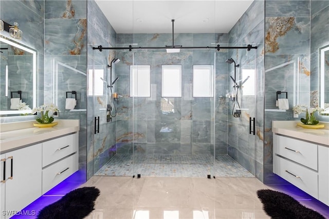 bathroom with vanity and a shower with shower door