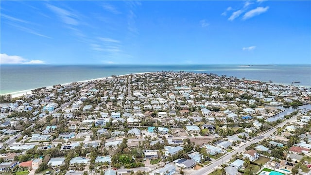 aerial view featuring a water view and a beach view