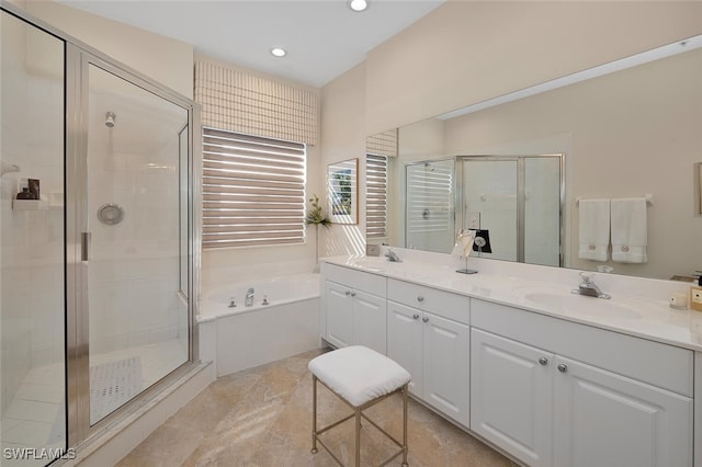 bathroom featuring vanity, tile patterned flooring, and shower with separate bathtub