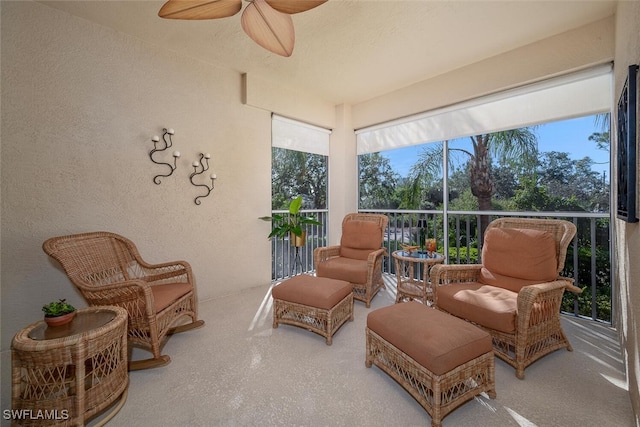 sunroom / solarium with ceiling fan