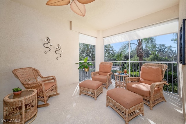 sunroom with a ceiling fan