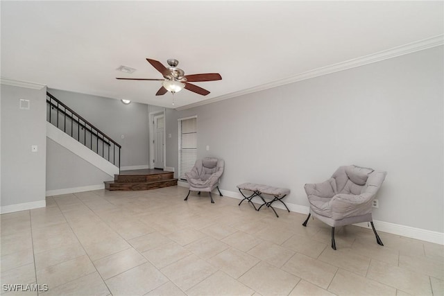 sitting room with light tile patterned floors, ceiling fan, and crown molding