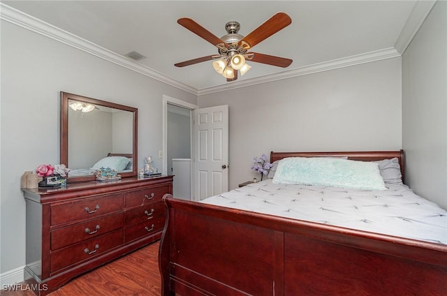 bedroom with dark hardwood / wood-style floors, ceiling fan, and crown molding