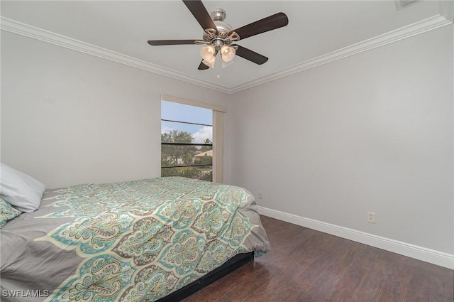 bedroom with ceiling fan, dark hardwood / wood-style floors, and ornamental molding