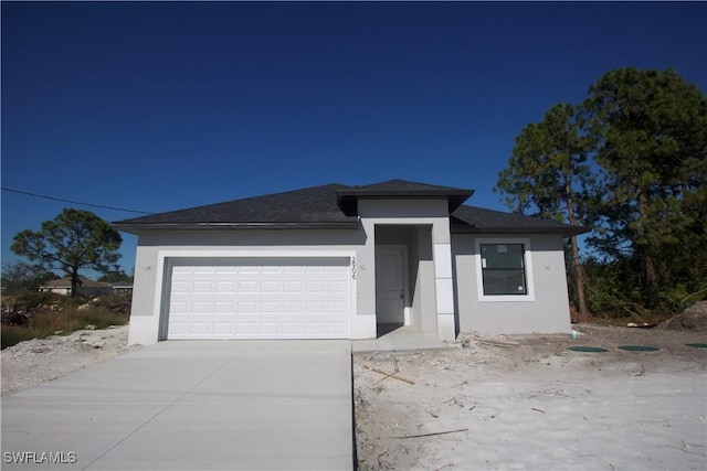 view of front of property featuring a garage