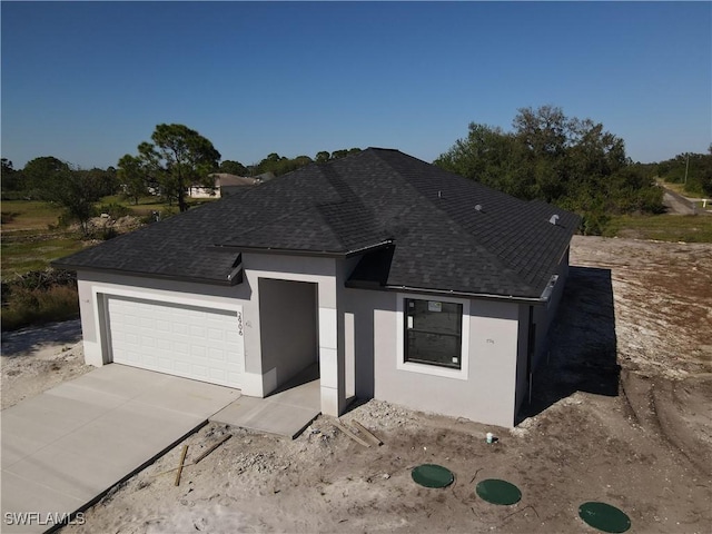 view of front of home with a garage