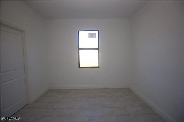 view of tiled empty room