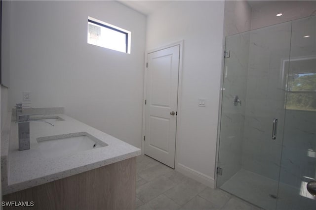 bathroom featuring vanity and walk in shower