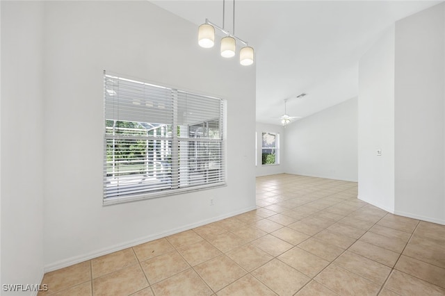 spare room with light tile patterned floors and ceiling fan