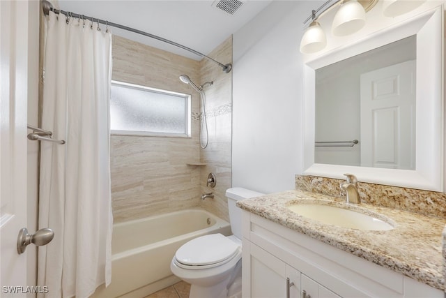 full bathroom featuring tile patterned floors, vanity, shower / tub combo, and toilet