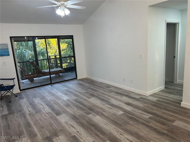 unfurnished room with dark hardwood / wood-style floors, ceiling fan, and lofted ceiling