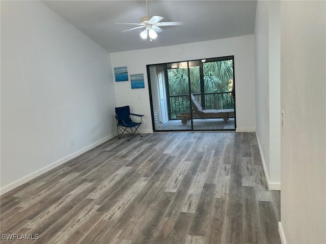 empty room with hardwood / wood-style floors and ceiling fan