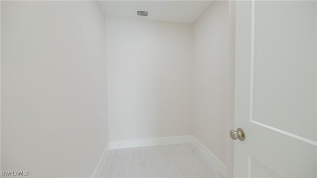 interior space featuring visible vents and baseboards