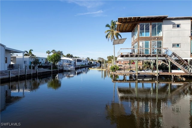 dock area with a water view