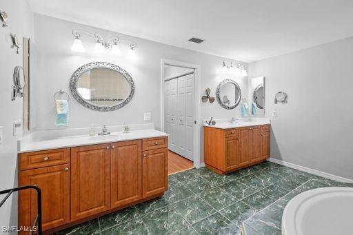 bathroom featuring vanity