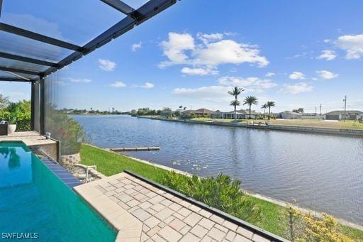 exterior space featuring a patio area and a water view