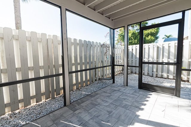 view of unfurnished sunroom