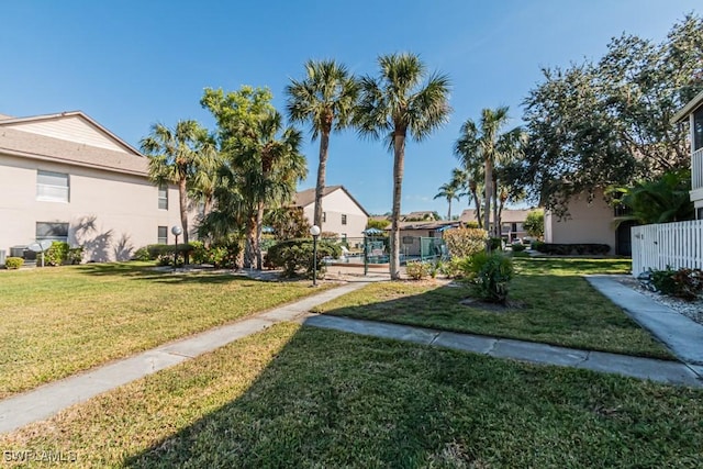 surrounding community featuring a lawn